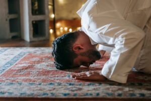 muslim man praying in mosque