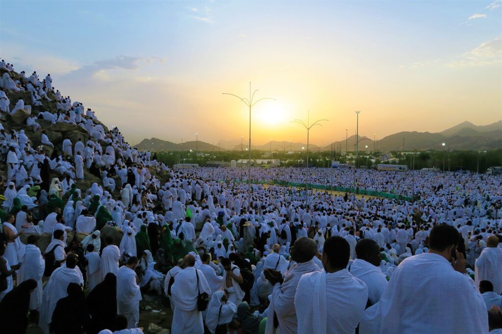 muslim pilgrims at the top mount arafat during hajj