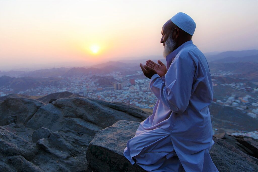 muslim man praying making dua during ramadan